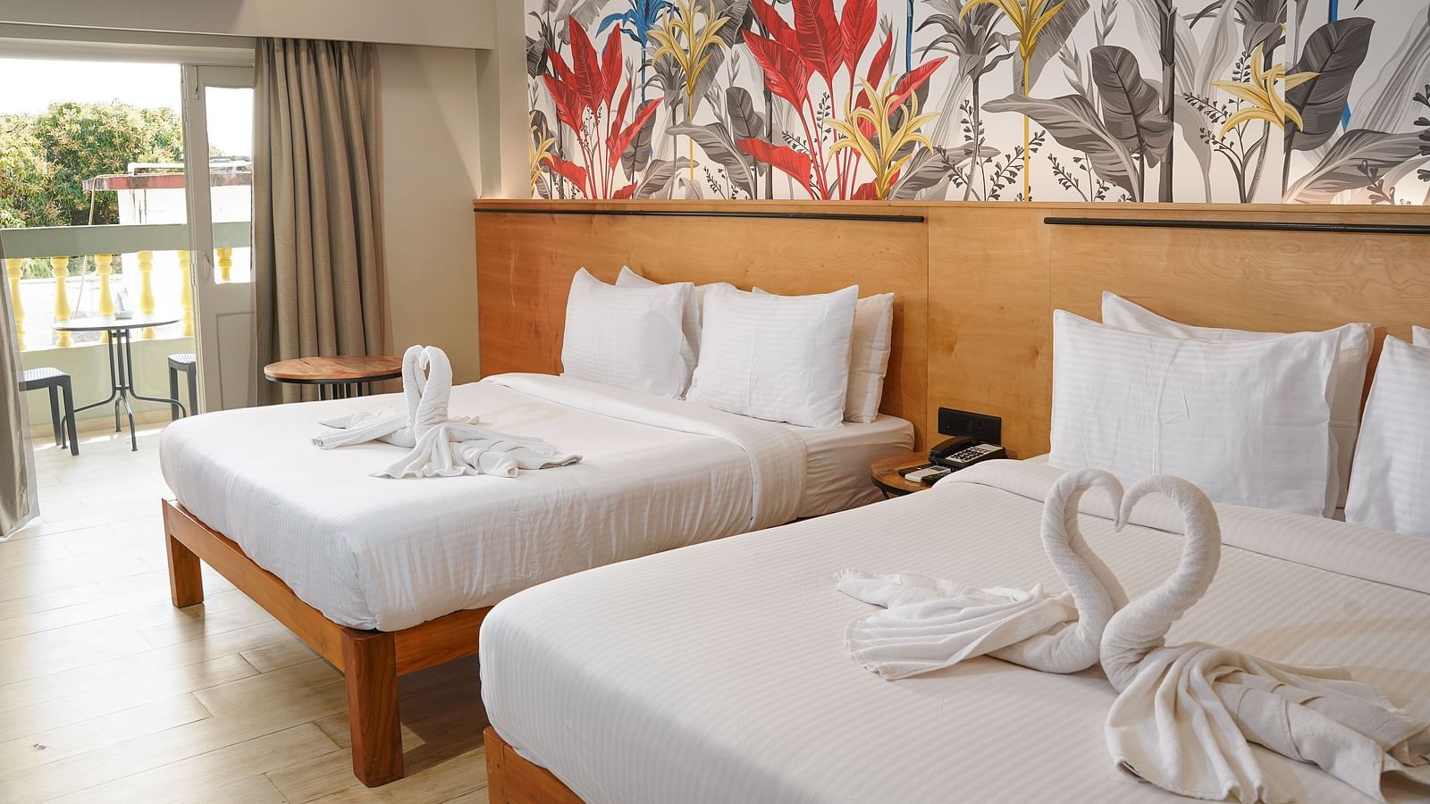 Two beds in Urban Corner Room at Indie Stays Resort, Goa